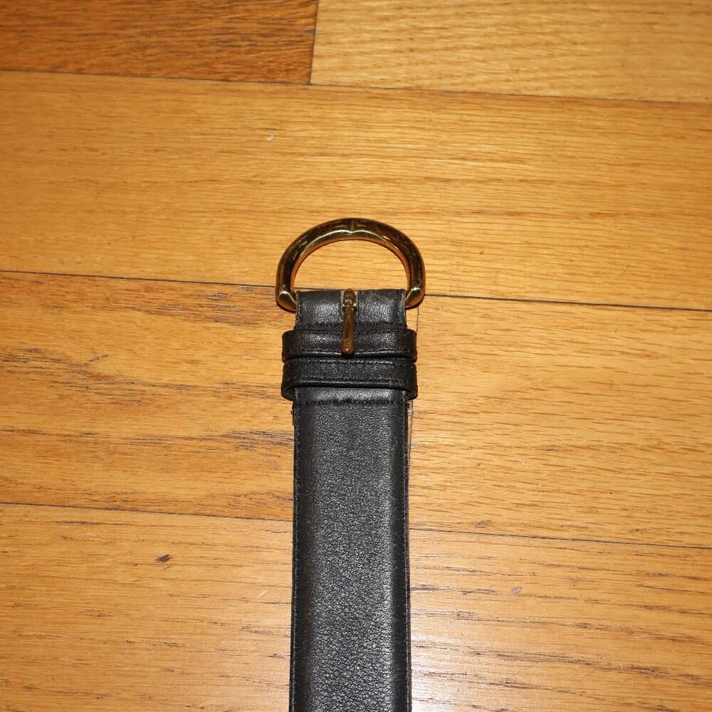 Navy belt with gold buckle
